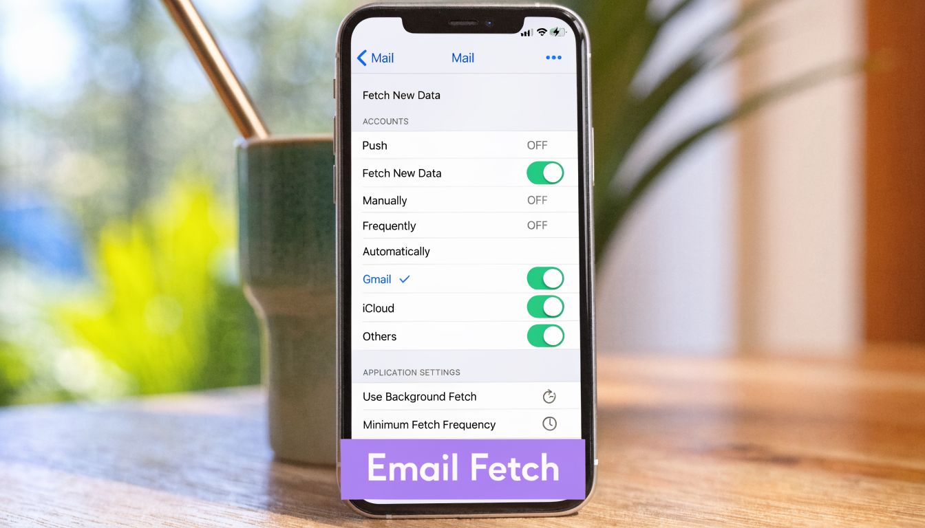 A smartphone screen displaying the Mail Fetch New Data settings menu for managing email account synchronization.